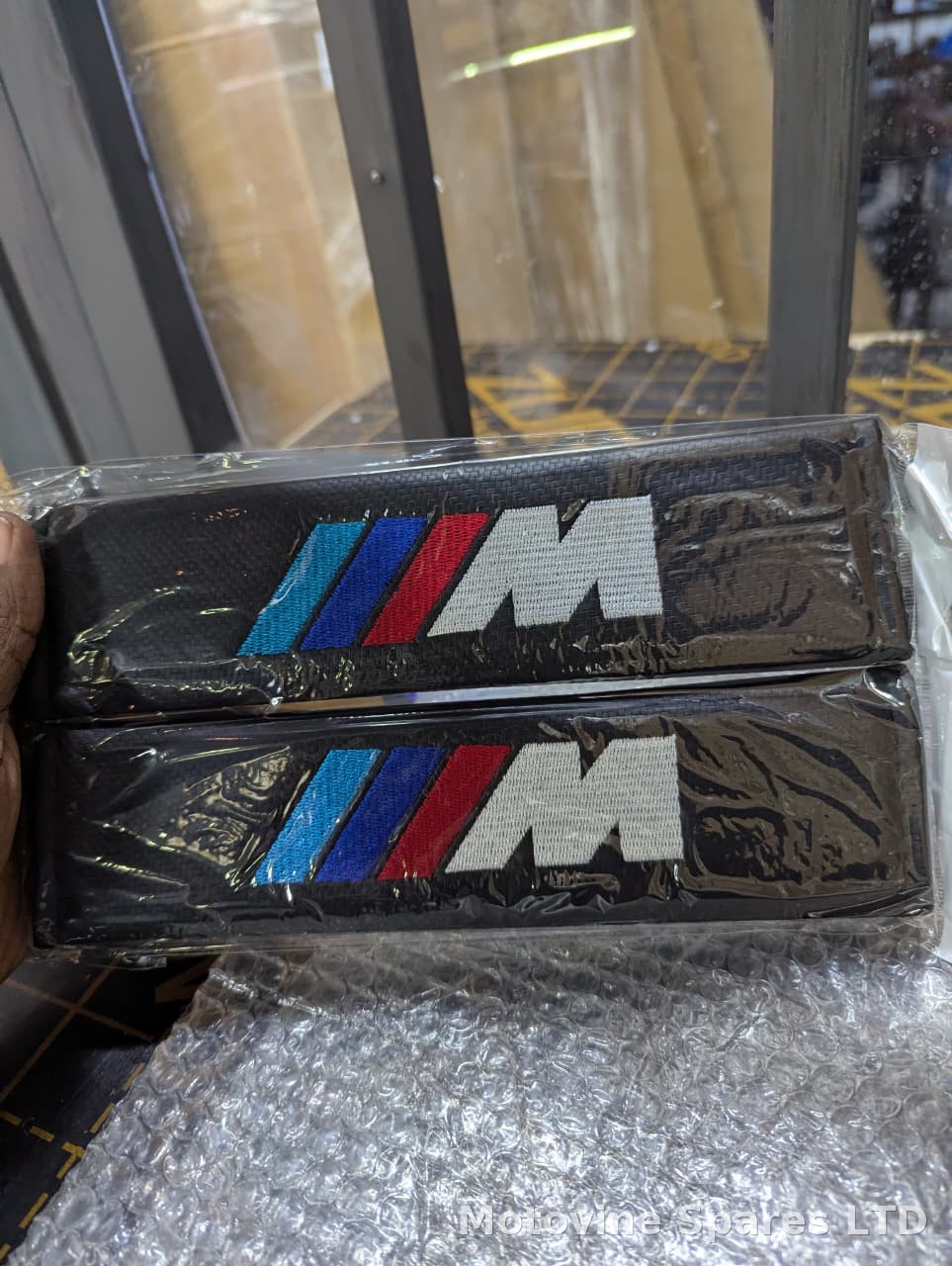 Safety belt shoulder pads