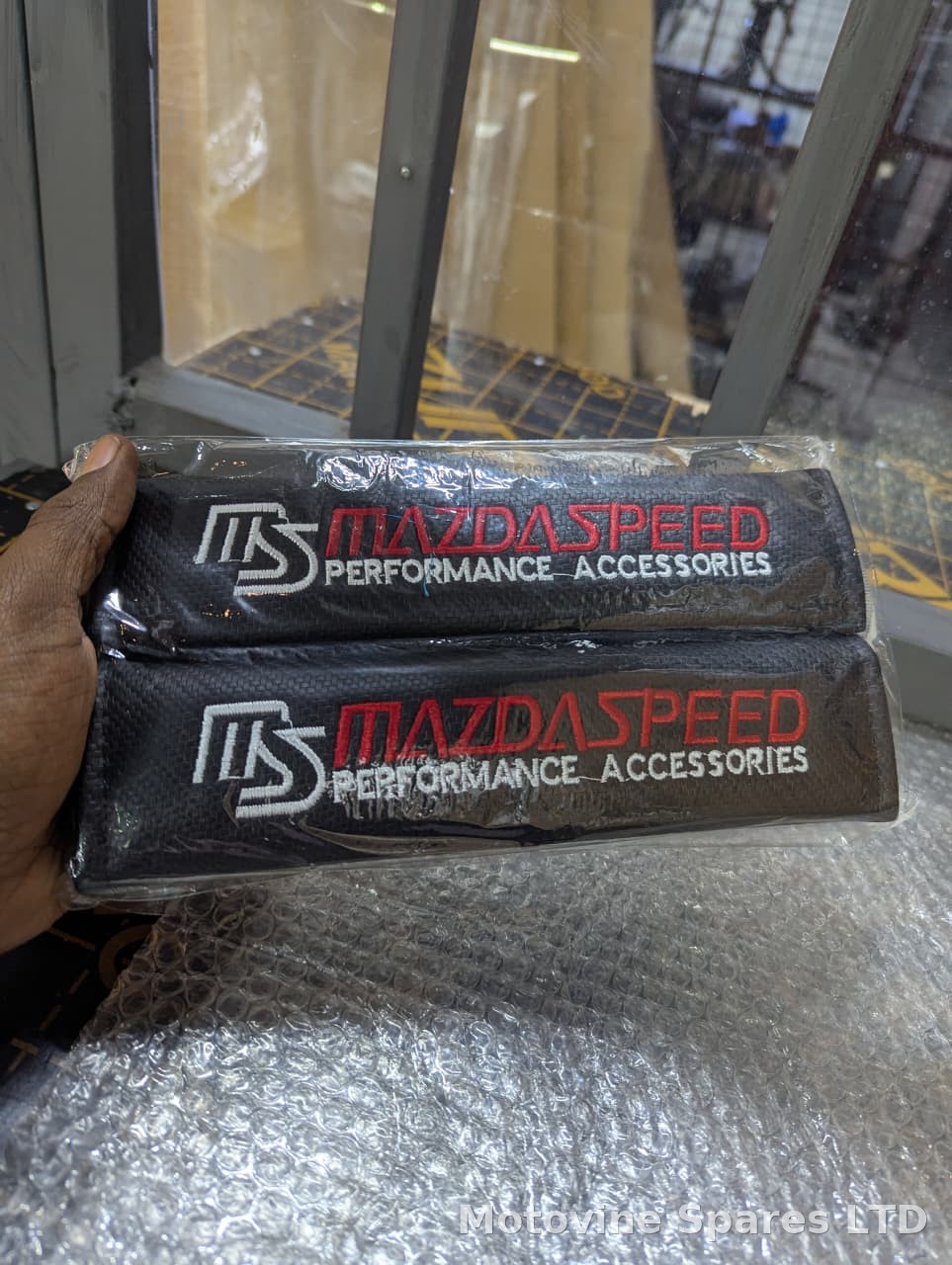 Safety belt shoulder pads